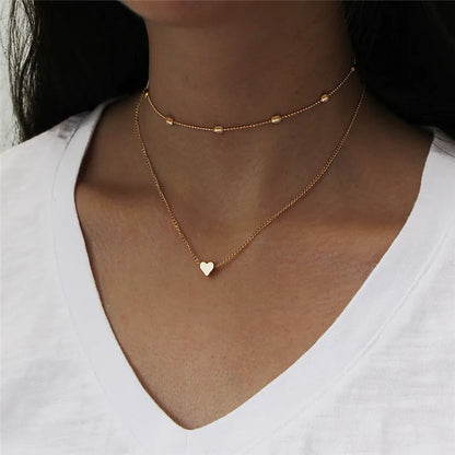 Endearing Three Layer Three Pendant Golden Metal Necklace