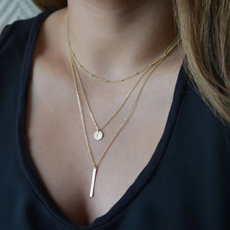 Endearing Three Layer Three Pendant Golden Metal Necklace