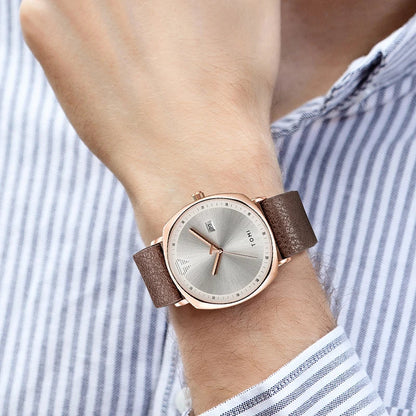 Timeless Elite: The Minimalist Leather Sports & Calendar Watch